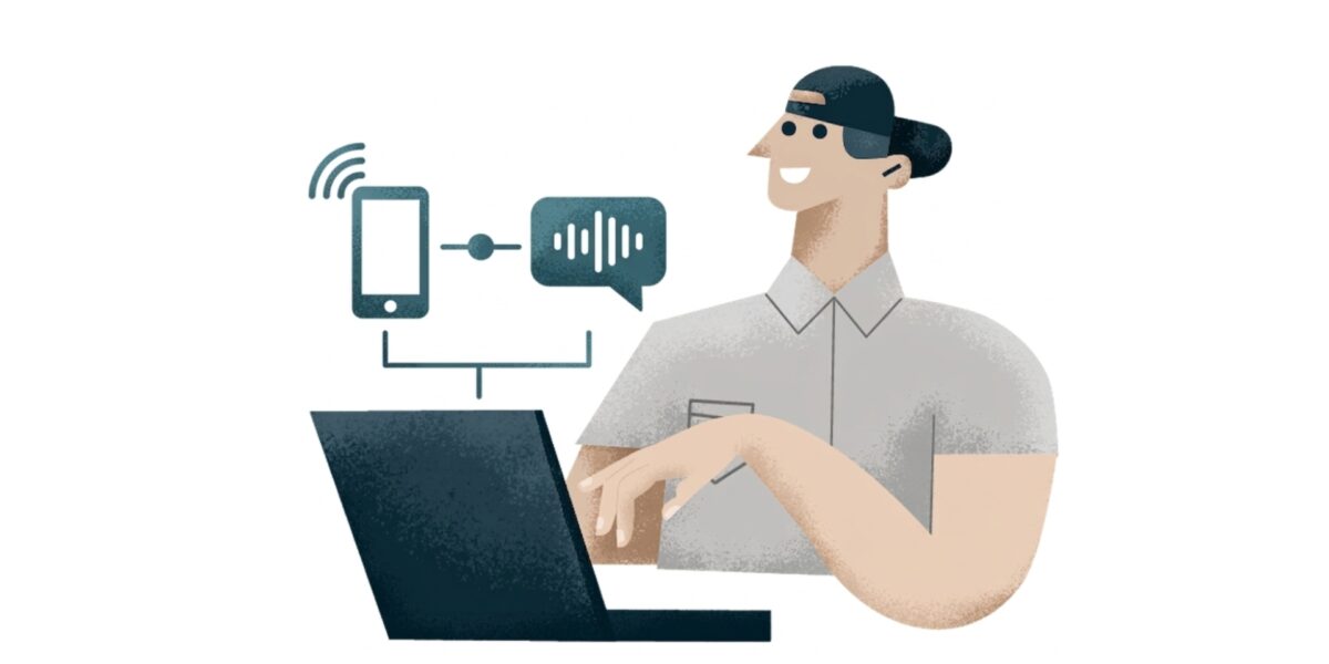 Person wearing a cap uses a laptop with a speech bubble showing a waveform, indicating online voice or chat communication.